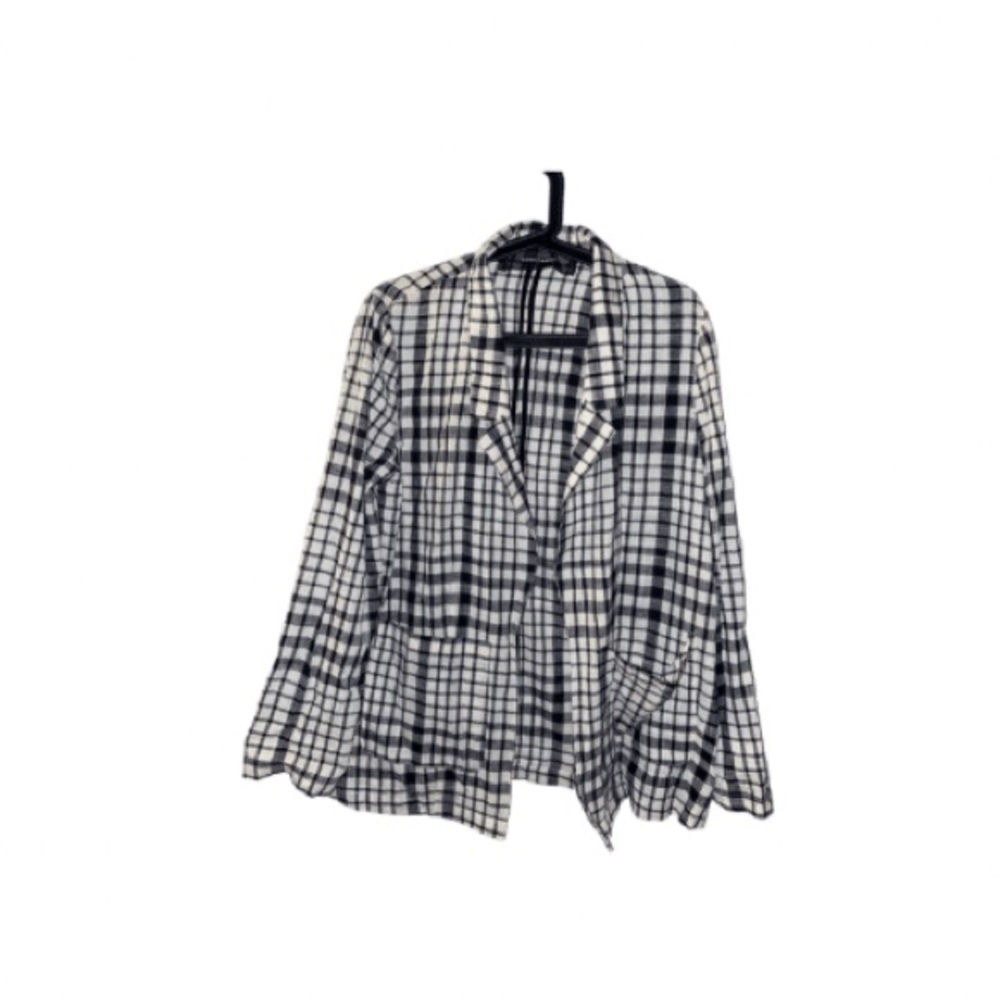 B&W plaid blazer.